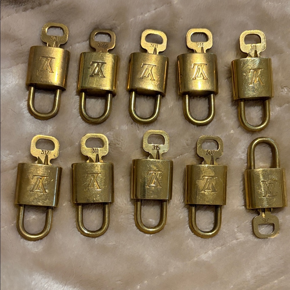 Louis Vuitton Padlocks with key..  solid brass